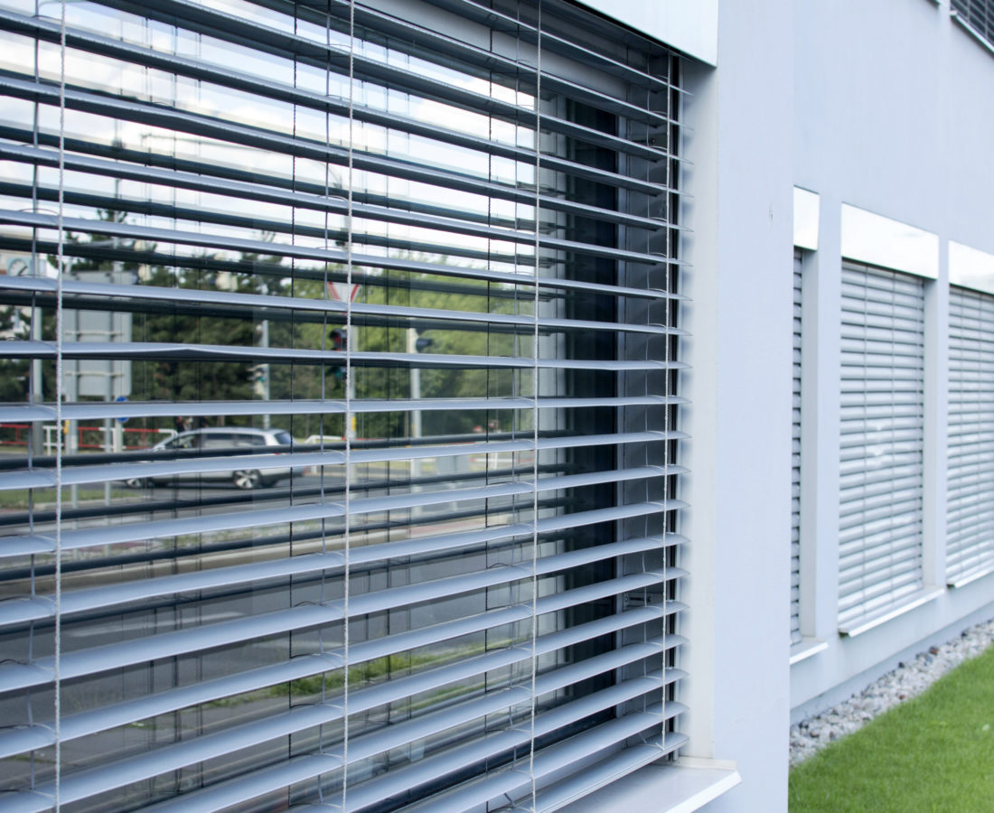 Curtains, blinds on the windows of an office building in the city